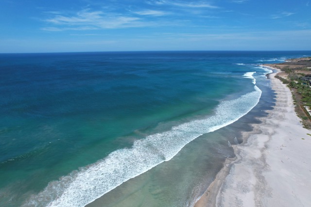 Aerial view of Tamarindo Beach and the Pacific coastline in Guanacaste, Costa Rica.
