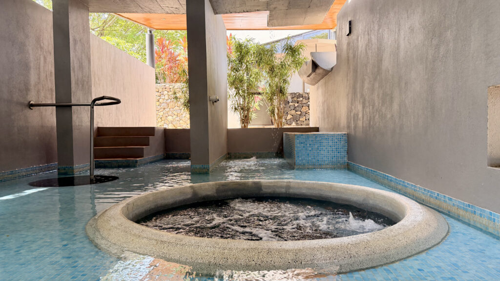 Cold plunge surrounded by tropical nature at Kalokairi Spa in Tamarindo, Costa Rica.