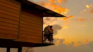 Couple enjoying the private terrace of a suite at Pacific Kalokairi adults-only boutique hotel in Tamarindo, Costa Rica.